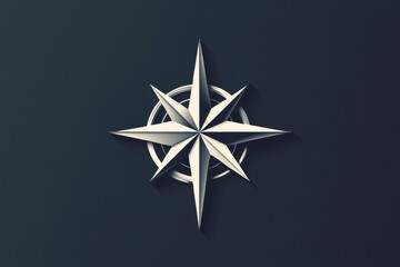 Obraz premium Stylized compass rose icon in metallic silver on a dark background, representing navigation, finding direction, and guidance