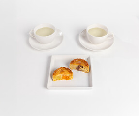 Traditional Mooncakes for Mid-Autumn Festival Celebration on White Background.