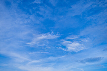 Daytime sky and clouds,blue sky background with white clouds.Sky clouds.Sky with white clouds.