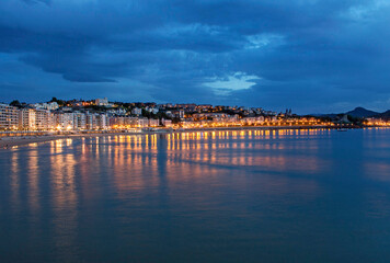 Blue hour, dusk, on La Concha beach in San Sebastian, Spain