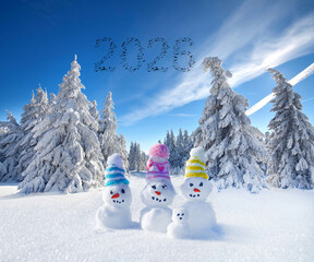 a group of whimsical snowman in the winter landscape with flying birds in shape of 2026 the new year