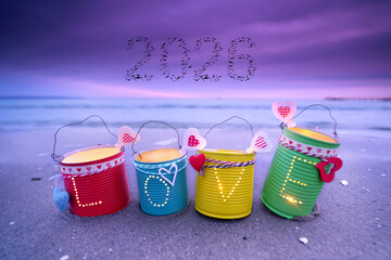 Shimmering LOVE Lanterns Crafted from Tin Cans on the beach for new year 2026