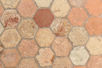 Hexagonal vintage beige tile in a french old manor