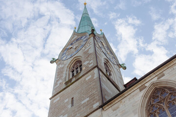 Fraumünster Church clock tower with blue sky in Zurich, Switzerlan