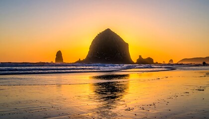 Haystack Rocks Golden Hour - A Coastal Sunset Spectacle.