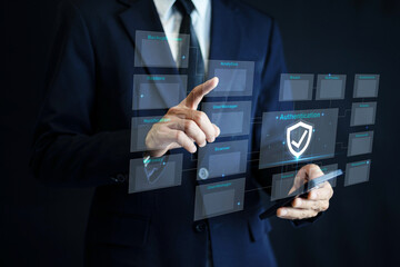 Businessman Cyber security on smartphone concept. Protecting sensitive business information through...