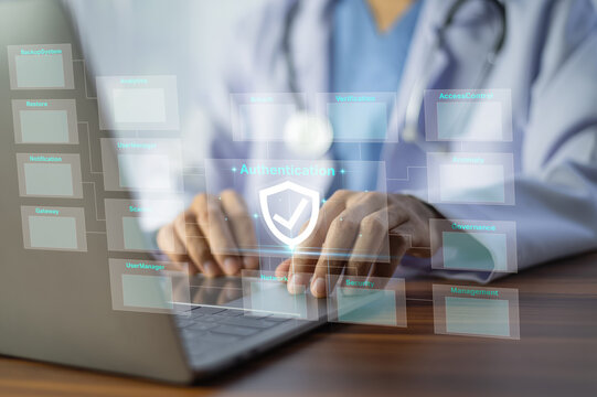 Doctor using laptop Cyber security network Data protection concept. Digital healthcare system safeguards sensitive patient data and maintains compliance with medical privacy regulations.
