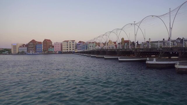 Willemstad, Curacao: Floating bridge opens in Central Willemstad, Handelskade, Punda, Queen Emma Bridge (Koningin Emmabrug), historic waterfront Cura&ccedil;ao&rsquo;s Dutch heritage. 