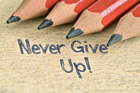 Red Pencils and Handwriting with the Text Never Give Up