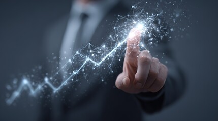 Business growth concept with hand pointing at graph