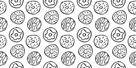 Seamless black and white doodle pattern of hand drawn donuts with texture. Sketchy sweet pattern with donuts on white background.