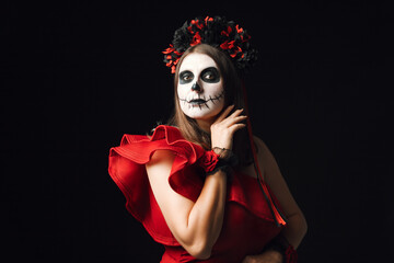 Woman with sugar skull makeup . Portrait of Calavera Catrina