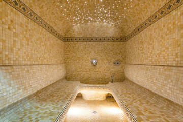 The delightful design of the Turkish bath hamam. Traditional oriental decor with mosaic tiles.