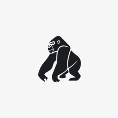 Obraz premium A stylized silhouette of a gorilla standing on all fours, facing left.