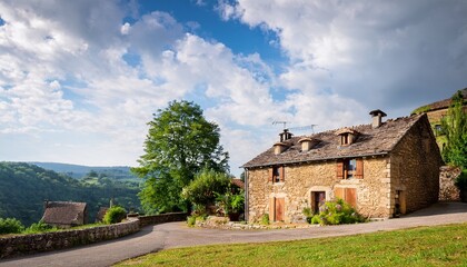 Fototapeta premium stone house in cavalerie village aveyron france