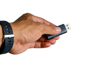 Close Up Of Hand Holding USB Flash Drive For Data Transfer And Digital Storage