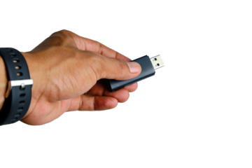 Close Up Of Hand Holding USB Flash Drive For Data Transfer And Digital Storage