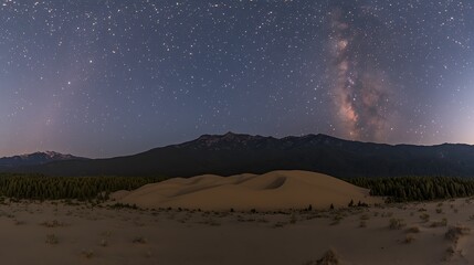 Golden desert illuminated by falling stars during colorful evening twilight
