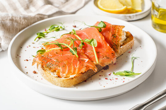 bruschetta with salmon on a white background