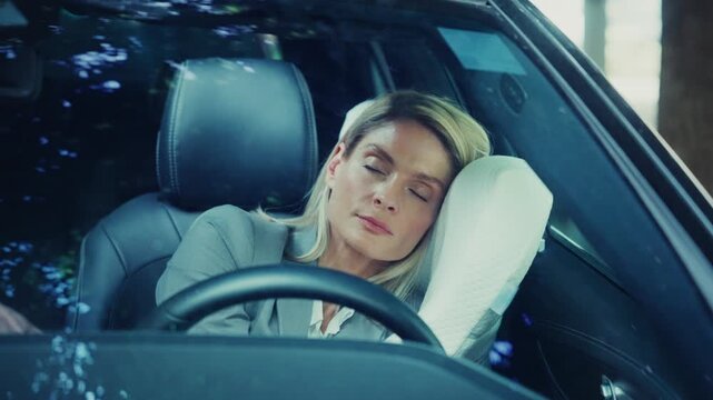 Tired Woman Sleeping Inside Car Resting on Pillow