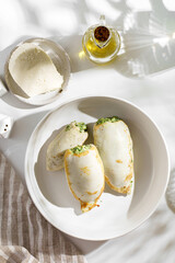 squid stuffed with cheese and herbs