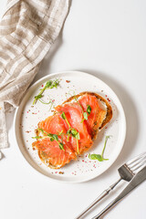 bruschetta with salmon on a white background