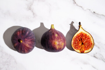 Close-up of sweet figs, fresh fruit with purple skin.