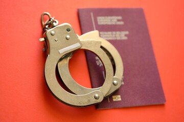 Belgium Passport With Police Handcuffs