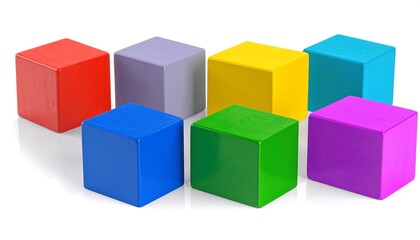 Obraz premium Seven wooden, brightly colored cubes are arranged in a semicircle against a clean white background, casting subtle shadows