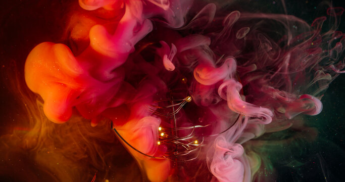 Smoke mix. Defocused colorful flare. Bright pink red green mist blending paint background. Light glass garland abstract fluid swirl.