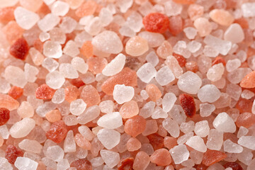 Close up texture of pink and white Himalayan salt crystals pink salt background