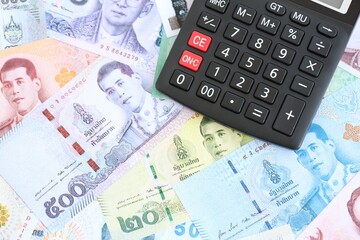 Thai baht currency money bills and calculator. The concept of taxation and money count