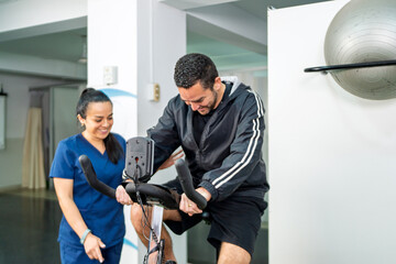 Physical therapy patient exercising on stationary bike