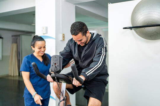 Physical therapy patient exercising on stationary bike