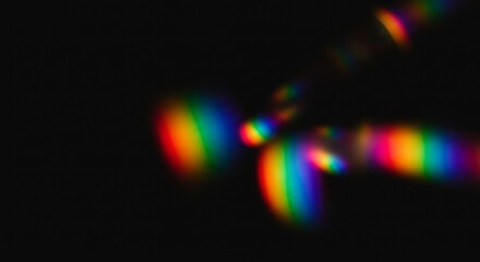 Abstract Rainbow Spectrum Light Bokeh on Black Background, Capturing Diffraction or Dispersion Effect for Scientific, Tech, or Artistic Designs