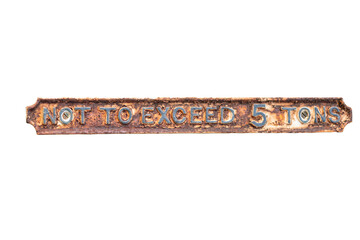 A rusty metal weight limit sign from a hoist by a canal, isolated on a transparent background.