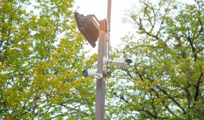 Security cameras in the outdoors.