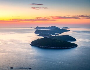 Islands at sunset over tranquil water