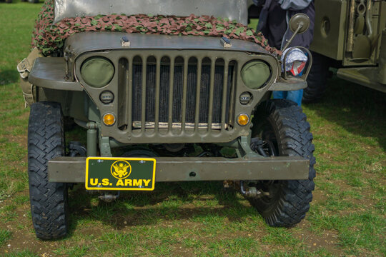 Flugplatzfest, Spitzerberg, Austria, Europe - August 24, 2025: the front of a restored vintage willys mb or ford gpw jeep in olive drab military paint, u.s. army license plate