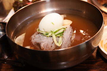 Korean cold noodles in chilled broth
