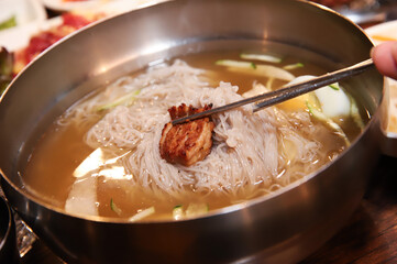 Korean cold noodles in chilled broth