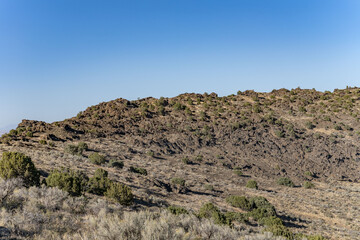North Menan Butte Trail, tuff cones - volcanoes. Madison County, Idaho. Snake River Plain. Tuff is a type of rock made of volcanic ash ejected from a vent during a volcanic eruption.  