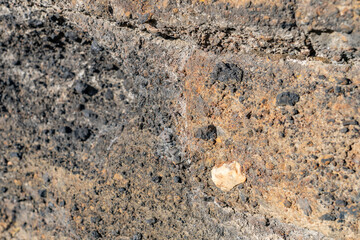 North Menan Butte Trail, tuff cones - volcanoes. Madison County, Idaho. Snake River Plain. Tuff is a type of rock made of volcanic ash ejected from a vent during a volcanic eruption.  Basalt, pebble