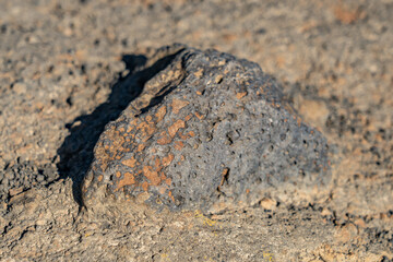 North Menan Butte Trail, tuff cones - volcanoes. Madison County, Idaho. Snake River Plain. Tuff is a type of rock made of volcanic ash ejected from a vent during a volcanic eruption.  Basalt