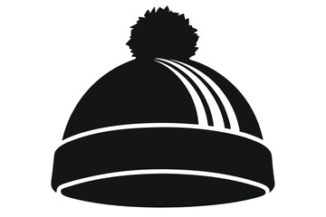Fototapeta premium Black and white winter hat has a pompom on top and striped accents