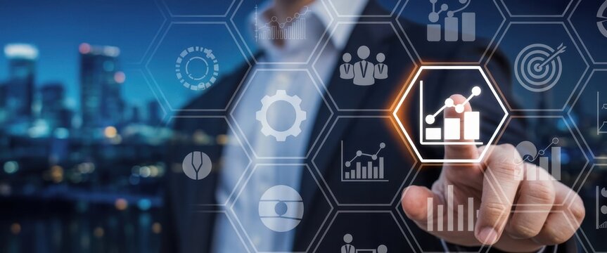 Data Driven Insights: A sharp, focused individual interacts with an illuminated interface displaying statistical charts and other business analytics symbols.