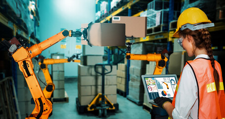 Smart robot arm systems for innovative warehouse and factory digital technology . Automation manufacturing robot controlled by industry engineering using IOT software connected to internet network .