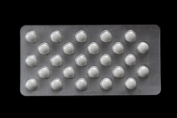 Medicine pills in silver blister pack. Pharmaceutical tablets isolated for healthcare and medical treatment concept, showing clean packaging and modern drug production.