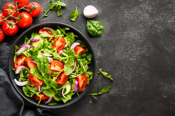 Fresh salad with leaves and vegetables.