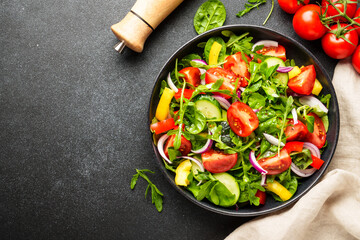 Fresh salad with leaves and vegetables.